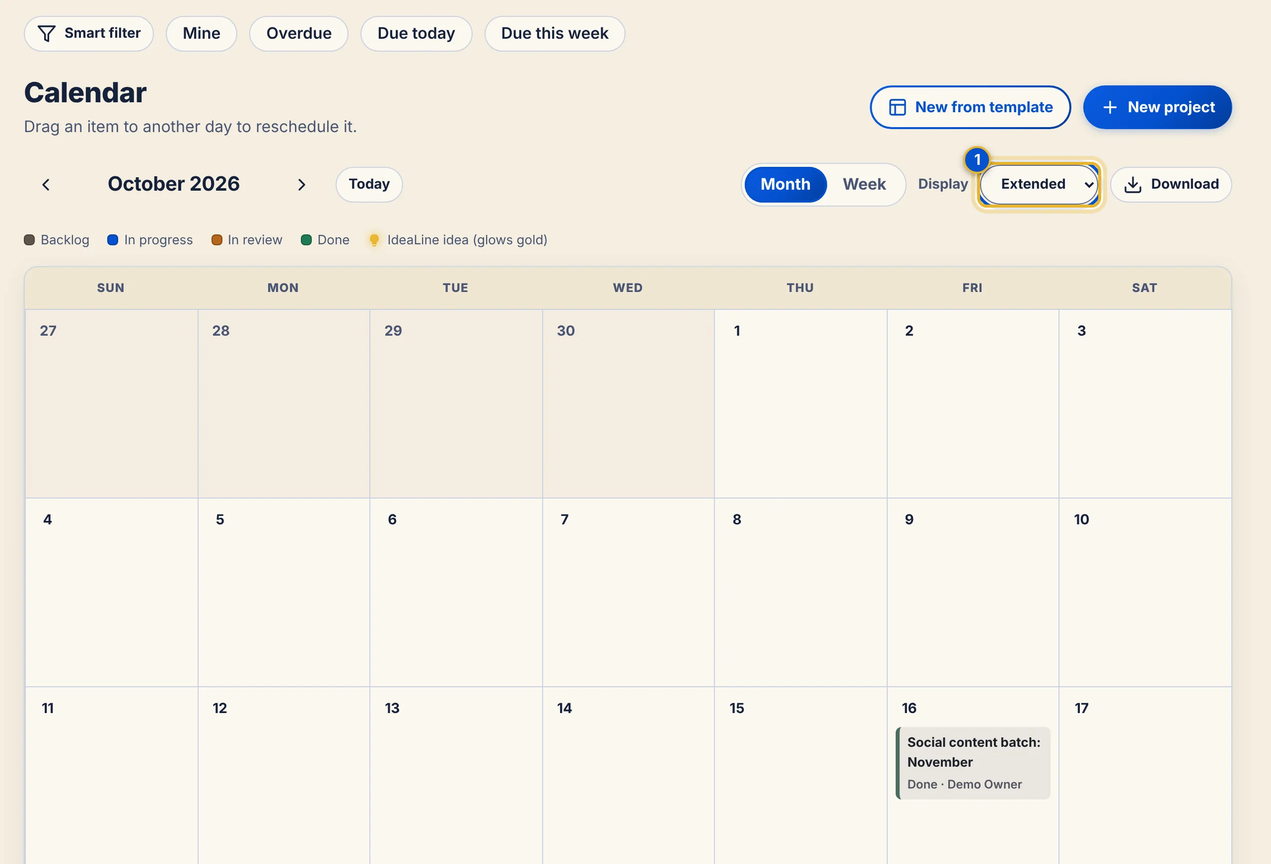 The month view in Extended size showing larger cards with status and assignee details.